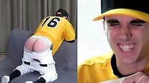 Undeceiving twink spanked in a baseball uniform