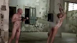 Young man is bound together with torturous in b. gay threesome