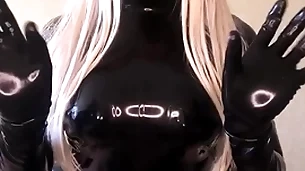 In the land of the living sensitive barbie doll in black latex catsuit