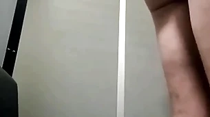 Sucking two dicks at the glory hole