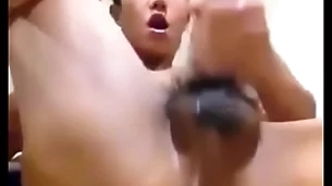 Asian guy shows crevice and jerks his cock