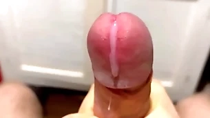Cumming in close-up with a massive portion of cum in slow motion / fat uncut veiny cock / pissing