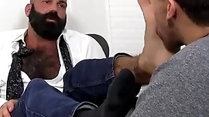 Bald bearded hunk foot worshipped and trained by young lad
